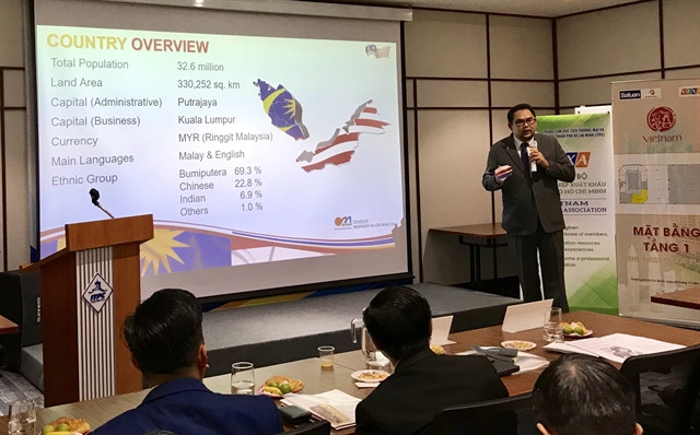 Raphy Md Radzi, Malaysian trade commissioner in HCM City, speaks at the seminar. VNS Photo Bồ Xuân Hiệp